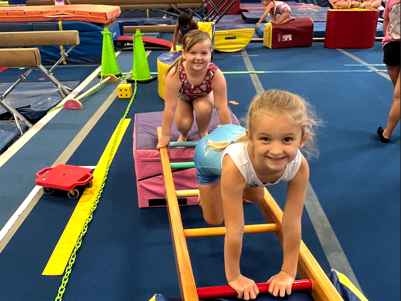 Children practicing on balance equipment